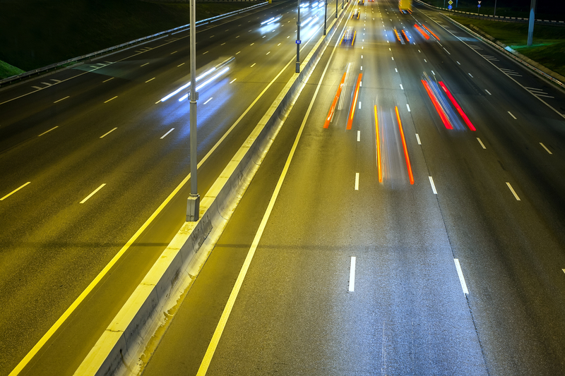 A highway at night. A highway at night.