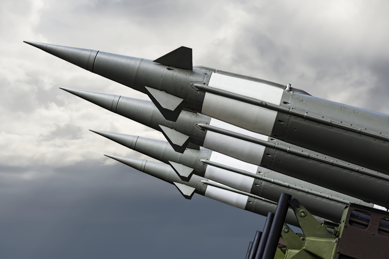 Nuclear Missles With Warhead Aimed at Stormy Sky. Nuclear Missles With Warhead Aimed at Stormy Sky.