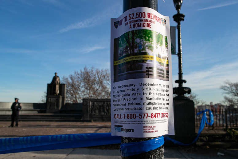 A sign advertising a reward for information regarding a homicide is posted at the entrance of Morningside Park on December 12, 2019 in New York City. Tessa Majors