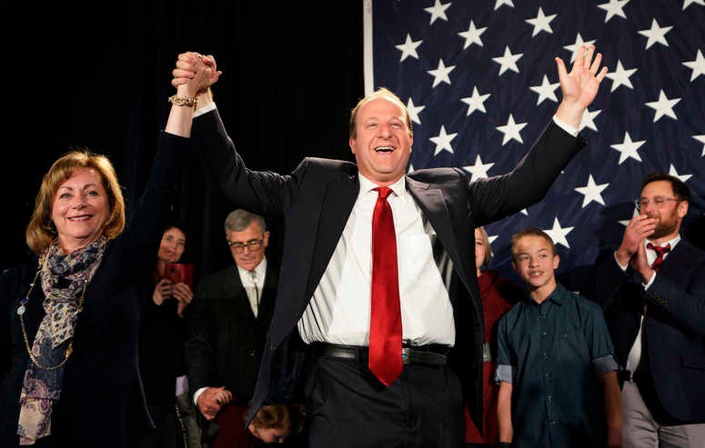 Democratic Colorado Governor-elect Jared Polis arrives onstage with running mate Dianne Primavera on November 6, 2018 in Denver, Colorado. (Photo by Rick T. Wilking/Getty Images)