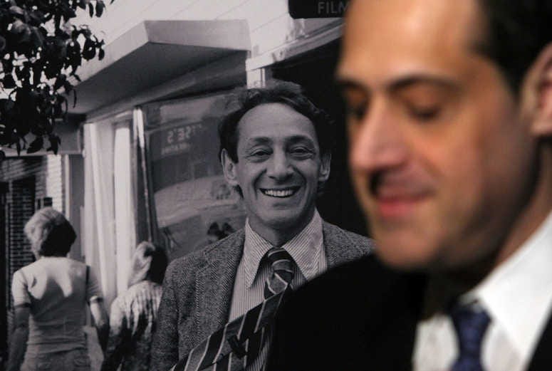 Stuart Milk, the nephew of the late gay activist Harvey Milk, sits next to a photograph of his uncle after a press conference announcing legislation to create a Harvey Milk Day in California March 3, 2009 in San Francisco. ( Justin Sullivan/Getty)