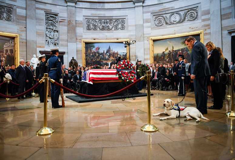 President George H.W. Bush's service dog Sully with former United States Secretary of Homeland Security Tom Ridge at the U.S. Capitol to honor late president. George H.W. Bush