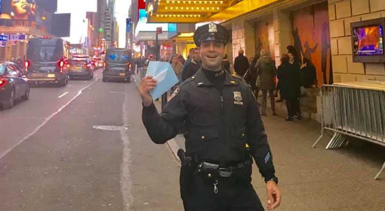 NYPD Officer Ricardo DiCandia helped an Irish tourist pay for Hamilton tickets after she spent days waiting in line. NYPD Officer Ricardo DiCandia helped an Irish tourist pay for Hamilton tickets after she spent days waiting in line.