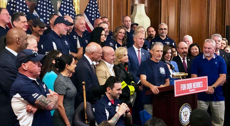 Entertainer and activist Jon Stewart, speaks at a news conference on behalf of 9/11 victims and families, Friday, July 12, 2019, at the Capitol in Washington