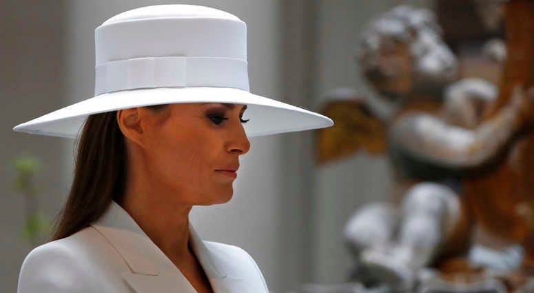Melania Trump in white hat
