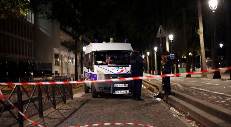 An evidence is seen at the site of a knife attack in Paris, Monday, Sept. 10, 2018. A several people were injured in a knife attack in central Paris late Sunday but police said that terrorism was not suspected. An evidence is seen at the site of a knife attack in Paris, Monday, Sept. 10, 2018. A several people were injured in a knife attack in central Paris late Sunday but police said that terrorism was not suspected.