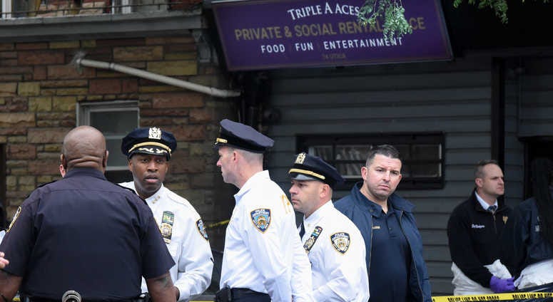A crime scene is established in front of the Triple A Aces social club on Utica Avenue on October 12, 2019 in New York City. Brooklyn gambling club shooting