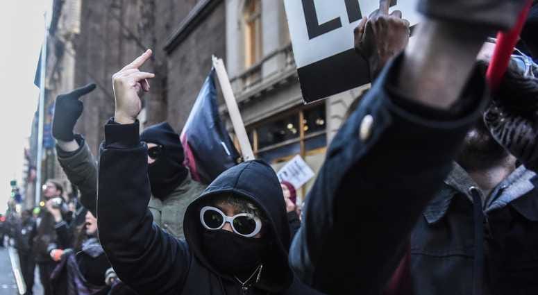 Protesters from various anti-fascist groups rally against the Proud Boys on November 16, 2019 in New York City. Antifa Proud Boys Trump Tower