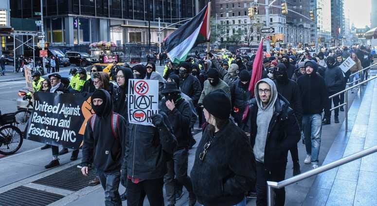 Protesters from various anti-fascist groups rally against the Proud Boys on November 16, 2019 in New York City. Antifa Proud Boys Trump Tower