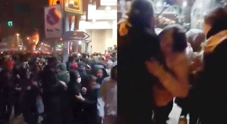 This image from a Sunday, Jan. 12, 2020 video provided by the New York-based Center for Human Rights in Iran shows a crowd fleeing police near Azadi, or Freedom, Square in Tehran, Iran. Iran