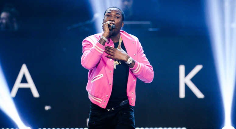 NEW YORK CITY - NOVEMBER 30: Meek Mill appears onstage at "Showtime at the Apollo" at the Apollo Theater on November 30, 2016 in New York City. NEW YORK CITY - NOVEMBER 30: Meek Mill appears onstage at "Showtime at the Apollo" at the Apollo Theater on November 30, 2016 in New York City.
