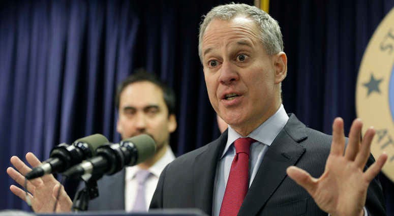 FILE - In this March 21, 2016, file photo, New York Attorney General Eric Schneiderman speaks during a news conference in New York. FILE - In this March 21, 2016, file photo, New York Attorney General Eric Schneiderman speaks during a news conference in New York.