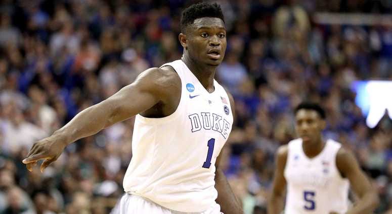 Zion Williamson Zion Williamson points on defense during a game at Duke.