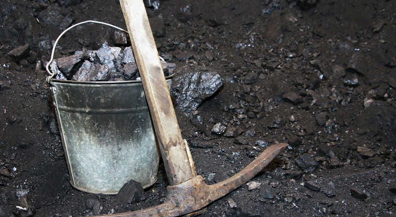 Coal and a pick axe. Coal and a pick axe