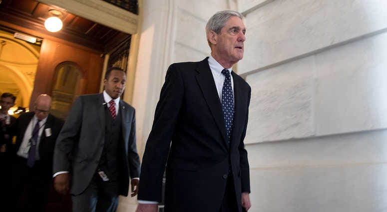 Former FBI Director Robert Mueller, front, the special counsel probing Russian interference in the 2016 U.S. election Robert Mueller