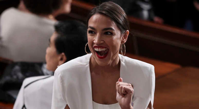 Rep. Alexandria Ocasio-Cortez, D-N.Y., reacts during President Donald Trump's State of the Union address to a joint session of Congress in the chamber of the U.S. House of Representatives on February 5, 2019 in Washington, DC. Alexandria Ocasio-Cortez
