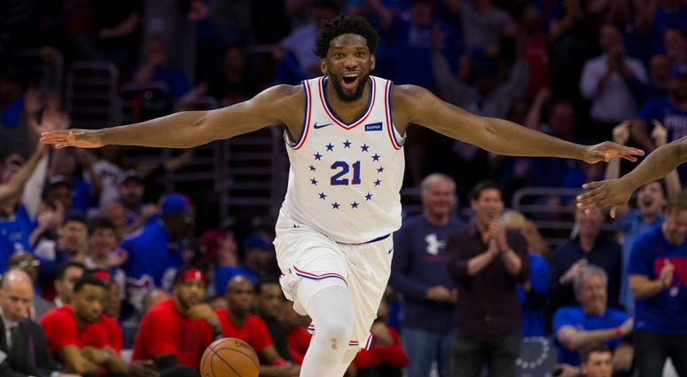 Joel Embiid Joel Embiid celebrates