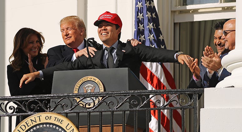 Nationals catcher Kurt Suzuki surprises President Trump by breaking out a 'Make America Great Again' hat during the Nats' White House ceremony Kurt Suzuki MAGA