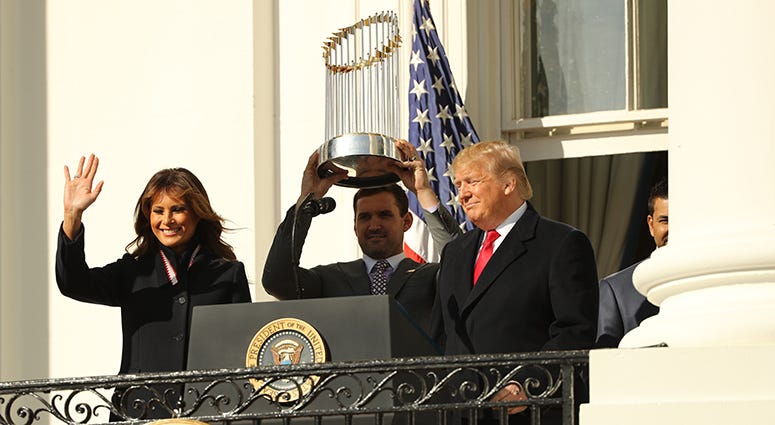 Ryan Zimmerman hoists the Commissioner's Trophy as the World Series champion Nationals are honored with a White House ceremony Ryan Zimmerman – Nationals' White House Visit