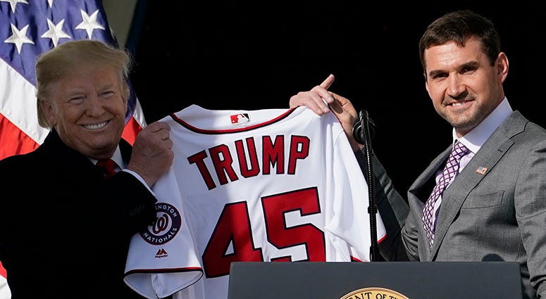 Ryan Zimmerman presents President Donald Trump with a 'Trump 45' Nationals jersey, the jersey signifying Trump as the 45th President of the United States Ryan Zimmerman – Nationals' White House Visit