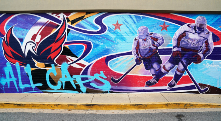 Caps mural at 4816 Bethesda, Ave, Bethesda, MD, designed by Aniekan Udofia Bethesda_Mural