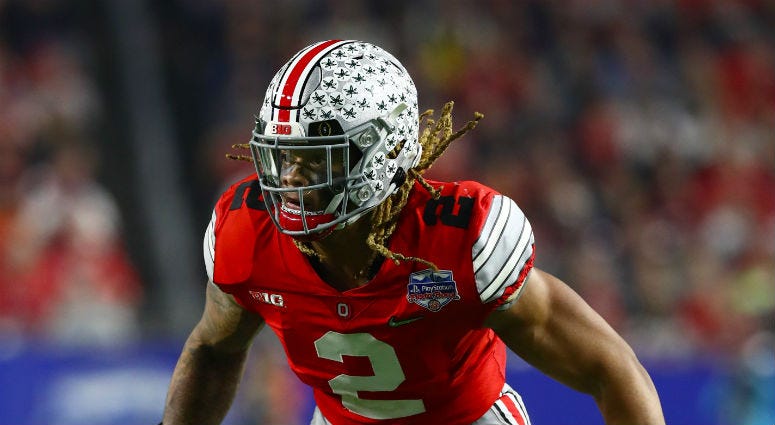 Ohio State star Chase Young gets ready to make a play. Chase Young will not work out at NFL Scouting Combine