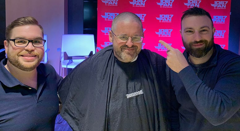 Chris Russell made a bet with Grant & Danny that the Redskins would win more than six games this season. He lost. So Russell had his head shaved, on air, on Thursday, December 12. WJFK-FM’s Chris Russell with Danny Rouhier and Grant Paulsen. Russell lost a bet and then lost his hair on the air on Thursday, December 12.