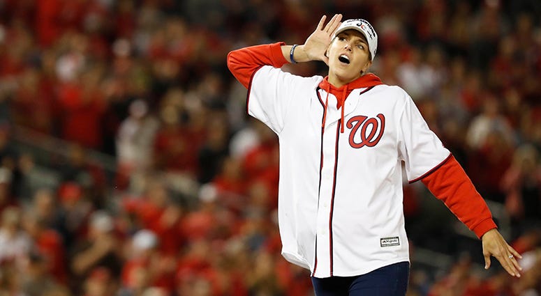 WNBA champion Elena Delle Donne reacts after throwing out the ceremonial first pitch in the NLCS Elena Delle Donne First Pitch