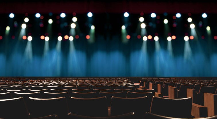A music or concert venue with empty seats.