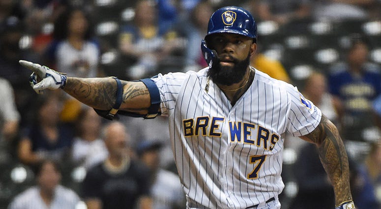 Eric Thames reacts after hitting a walk-off home run for the Brewers in 2019 Nationals to sign Eric Thames to one-year deal