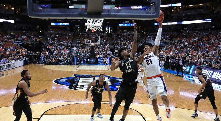 Rui Hachimura drives to the basket against Terance Mann of Florida State in the 2019 NCAA Men's Basketball Tournament Rui Hachimura drives to the basket against Terance Mann of Florida State in the 2019 NCAA Men's Basketball Tournament