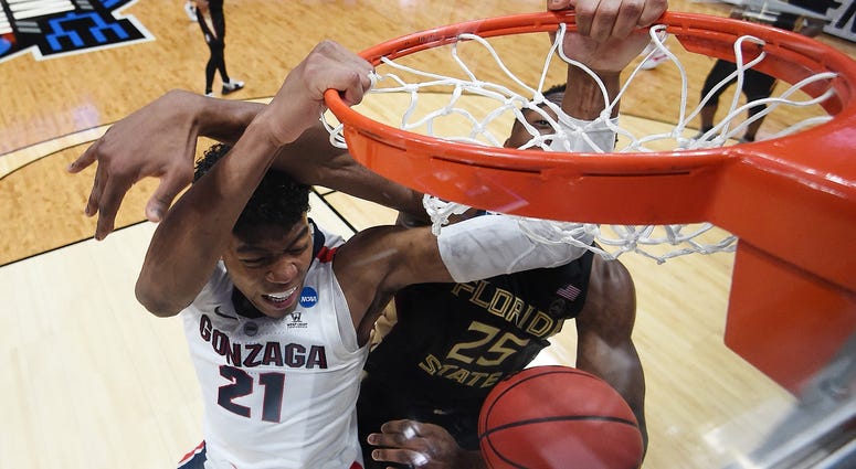 Rui Hachimura of the Gonzaga Bulldogs dunks the ball against Mfiondu Kabengele of the Florida State Seminoles during the 2019 NCAA Men's Basketball Tournament Rui Hachimura of the Gonzaga Bulldogs dunks the ball against Mfiondu Kabengele of the Florida State Seminoles during the 2019 NCAA Men's Basketball Tournament