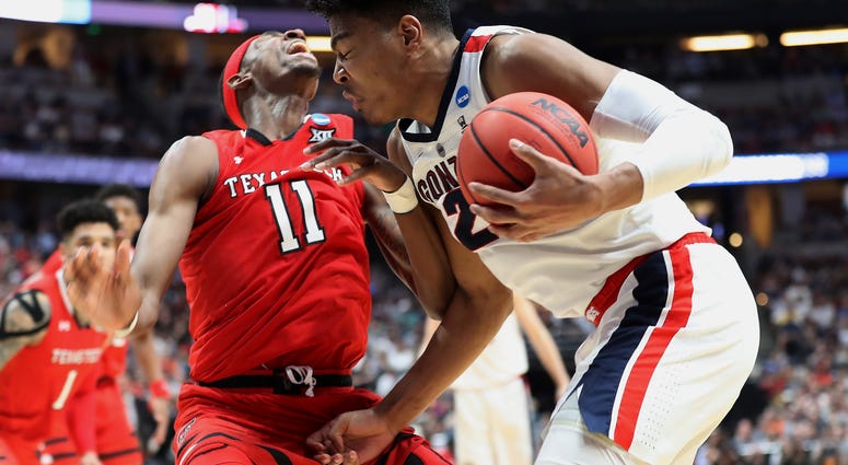 Rui Hachimura drives against Tariq Owens of Texas Tech in the 2019 NCAA Men's Basketball Tournament West Regional Rui Hachimura drives against Tariq Owens of Texas Tech in the 2019 NCAA Men's Basketball Tournament West Regional