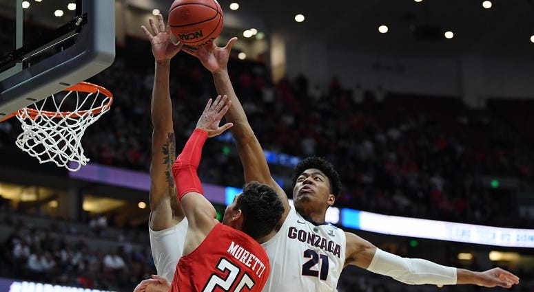 Gonzaga's Rui Hachimura blocks the shot of Davide Moretti of Texas Tech in the 2019 NCAA Men's Basketball Tournament West Regional Gonzaga's Rui Hachimura blocks the shot of Davide Moretti of Texas Tech in the 2019 NCAA Men's Basketball Tournament West Regional