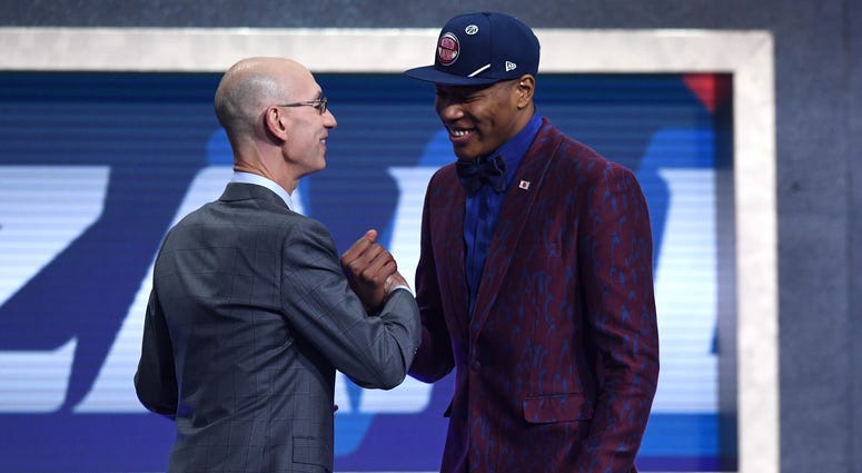Rui Hachimura poses with NBA Commissioner Adam Silver after being drafted with the ninth overall pick by the Washington Wizards during the 2019 NBA Draft at the Barclays Center Rui Hachimura poses with NBA Commissioner Adam Silver after being drafted with the ninth overall pick by the Washington Wizards during the 2019 NBA Draft at the Barclays Center