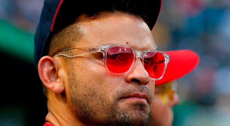 Baby Shark wasn't the only thing Gerardo Parra brought: The red Bubly sunglasses were big, too. Gerardo Parra of the Washington Nationals wearing his famous red-tinged sun glasses.