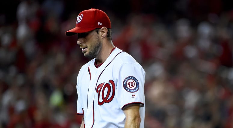 Max Scherzer pitched five innings, allowed three runs. PHOTOS: Stay in the fight! Nats beat Brewers in Wild Card