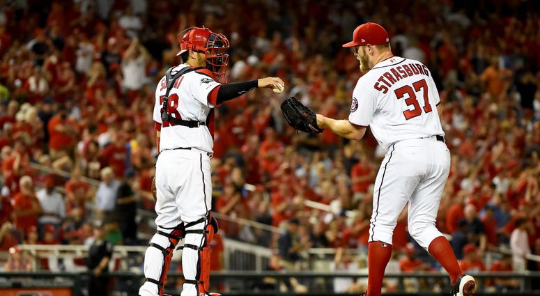 Stephen Strasburg entered with Nats down 3-1 in 6th inning. PHOTOS: Stay in the fight! Nats beat Brewers in Wild Card