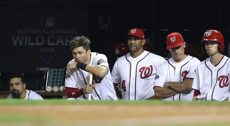 Nats dugout in need of a hero. PHOTOS: Stay in the fight! Nats beat Brewers in Wild Card