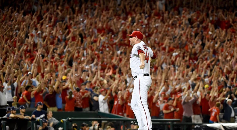 Danile Hudson got the save in Nats' 4-3 win. PHOTOS: Stay in the fight! Nats beat Brewers in Wild Card