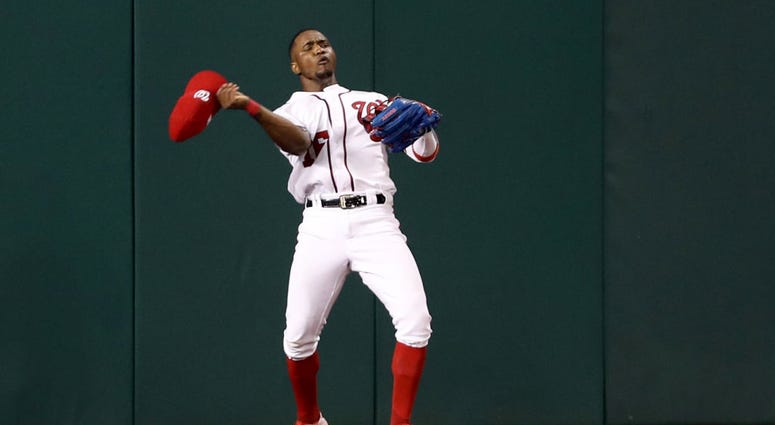 Hats off to the Nats, they are LA-bound. PHOTOS: Stay in the fight! Nats beat Brewers in Wild Card