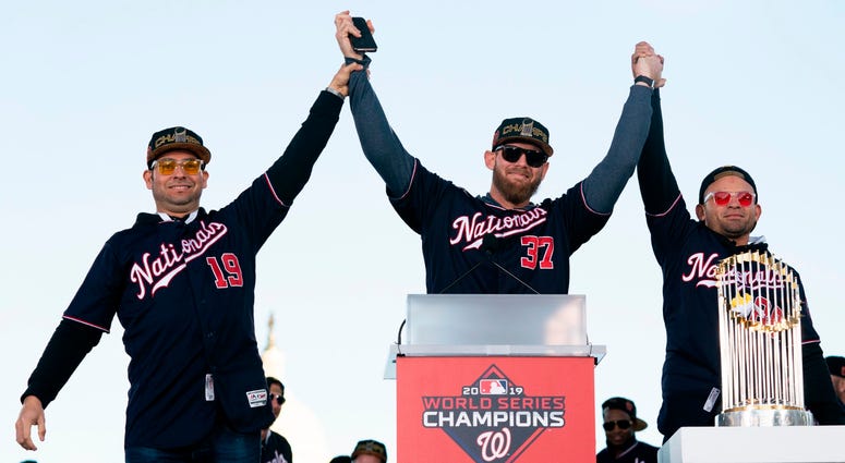 Anibal Sanchez, Stephen Strasburg, and Gerardo Parra at the World Series parade. Photos of Nationals' World Series parade are insane