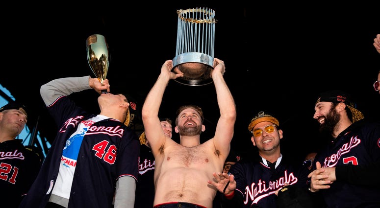 A shirtless Brian Dozier at the World Series parade because, of course. Photos of Nationals' World Series parade are insane