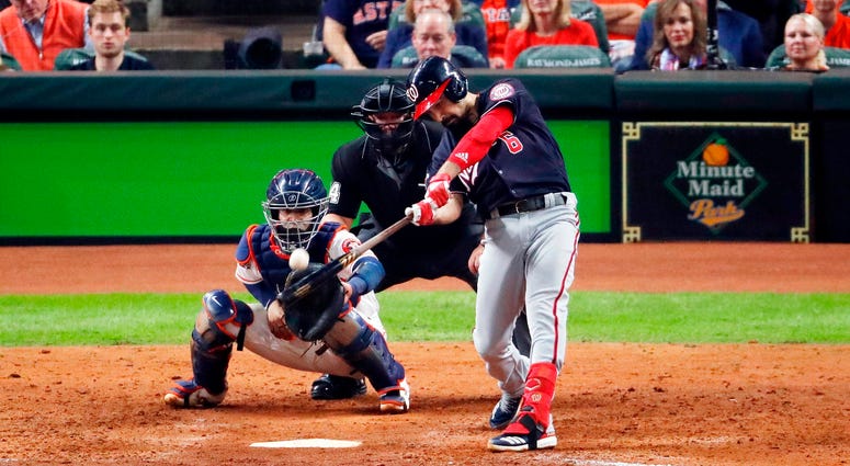 Anthony Rendon said, "Ball don't lie." Best pictures of World Series umpire controversy, Dave Martinez ejection