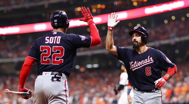 After umps made the call, Anthony Rendon hit a two-run homer in Game 6 of the World Series. Anthony Rendon is congratulated by his teammate Juan Soto after hitting a two-run home run.