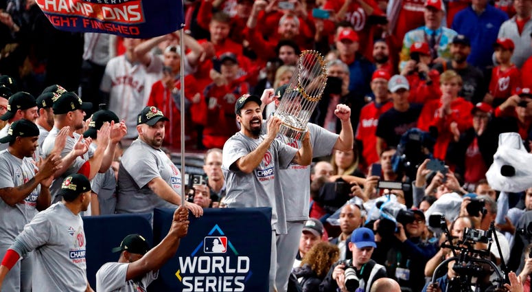 Anthony Rendon hoists the World Series trophy with the Washington Nationals. Anthony Rendon hoists the World Series trophy with the Washington Nationals.