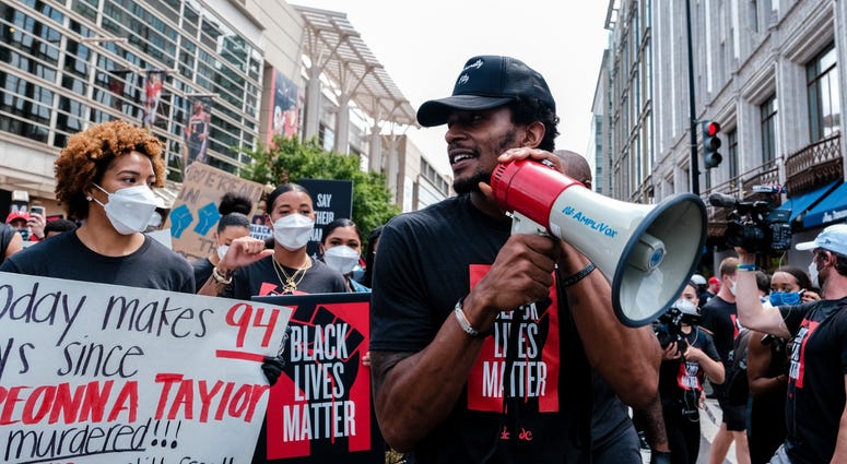Bradley Beal leads the march to the MLK Memorial to support Black Lives Matter and to mark the liberation of slavery DC's Juneteenth march to the Martin Luther King, Jr. Memorial