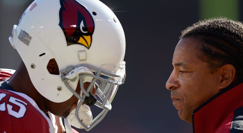 Then-Cardinals defensive coordinator Ray Horton talks to one of his defensive backs in 2012 Paulsen: Redskins offering DBs position to Ray Horton
