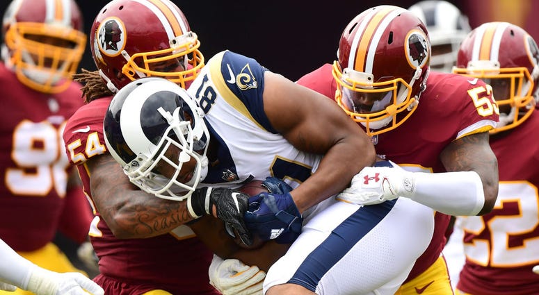 Redskins linebackers Mason Foster (54) and Zach Brown (53) make a tackle against the Rams Redskins reportedly shopping Mason Foster, Zach Brown