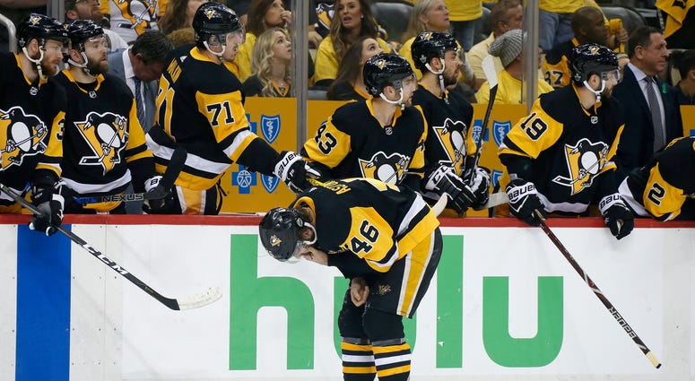Zach Aston-Reese skates off the ice after getting hit by Tom Wilson Zach_Aston_Reese